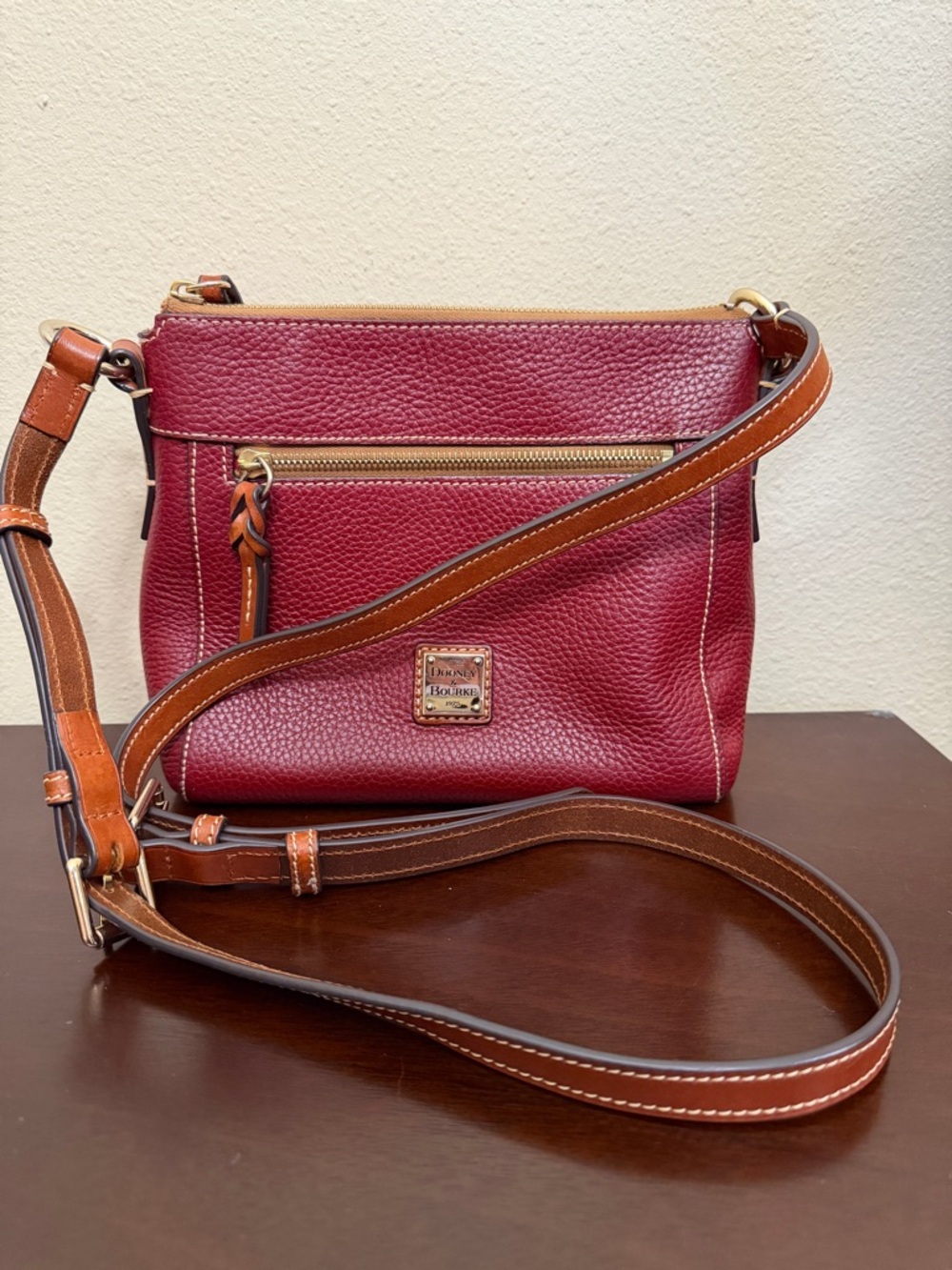 Dooney & Bourke Burgundy Crossbody with Tan Trim and Gold Hardware